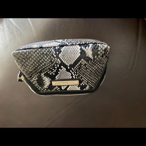Calvin Klein snakeskin cosmetic bag